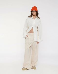 At the intersection of everyday and occasionwear, the RYE trousers find a smart-casual balance that makes this transseasonal piece the champion of versatility. The fluid drape emphasizes the long, wide-leg silhouette while the lowrise fit adds a cool, laidback vibe. Detailed with pleats, the RYE trousers offer a classic sleek look. The model is 178 cm and wears a size S.Composition: 15% RAY, 80% PES, 5% SP Machine wash at 40°. Iron on medium. Do not bleach. Do not tumble dry. Please be aware tha Knit Tees, Sleek Look, Rye, Smart Casual, Occasion Wear, Bleach, Wide Leg, Coats Jackets, Composition