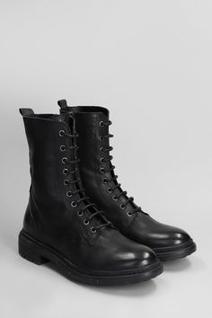 Combat boots in black leather, round toe, laces, pull tab on backside, side zip closure, rubber sole, heel 4,5, 100% leather, Made in Italy Marni Bag, Golden Goose Shoes, Golden Goose Deluxe Brand, Valentino Bags, Green Shoes, Sneaker Wedge, Sneaker Brands, Pull Tab, Manolo Blahnik