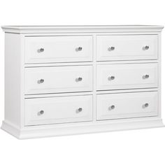 a white dresser with six drawers and two doors