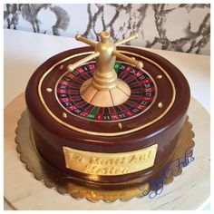 a cake with a casino wheel on top