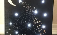 a card with stars and the moon on it