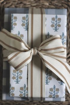 a wrapped gift box with a bow on it