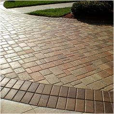 an image of a brick walkway with the words attractive patio and driveway paverss