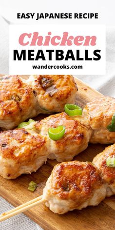 chicken meatballs on a wooden cutting board with chopsticks