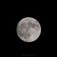 the full moon is seen in the dark sky