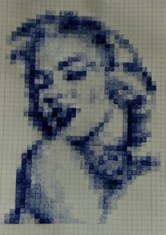 a drawing of a man's face made out of blue and white squares on paper