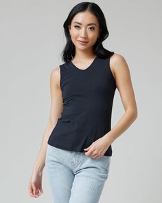 Indulge in the versatile elegance of our Reversible Tank. Crafted from our signature smooth tri-blend fabric, this tank offers a luxurious blend of modal, nylon, and spandex that drapes beautifully on the body. The reversible design allows you to effortlessly transition from a classic scoop neck to a chic V-neck. Fall Jeans, Swim Trends, One Piece Suit, Sweater Sale, Knee Length Dresses, Spring Collection, Black Media, Jeans Dress, Special Occasion Dresses