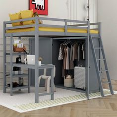 a loft bed with a desk underneath it and yellow pillows on the bottom bunk beds