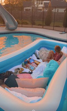 an inflatable pool is filled with items