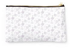 a white and purple pouch bag with small diamonds on it