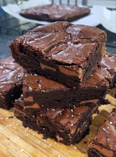 chocolate brownies stacked on top of each other