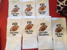 six white towels with footballs on them and the number one is for each team