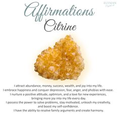 a piece of yellow crystals with the words affirmationss etine on it