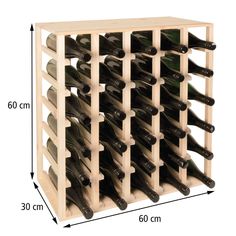 a wooden wine rack is shown with the measurements for each bottle in front of it