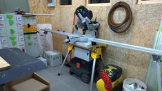 a workbench with tools on it in a room