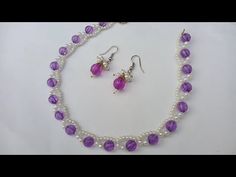 a necklace and earring set with purple beads