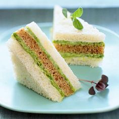 two pieces of cake on a plate with one slice cut out and the other half eaten