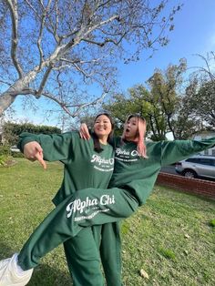 Two alpha chi omega sorority sisters in their custom fresh prints sweat pants and Crewneck sweatshirts. Green sweat set with vintage varsity design. Frat Merch Ideas, Sorority Sweat Sets, Sorority Sweat Set, Sorority Apparel Ideas, Sisterhood Retreat, Lake Pics, Casual Comfy Outfit, Matching Sweat Set, Philanthropy Events