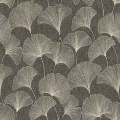 a black and white floral wallpaper with large leaves on the front, in shades of grey