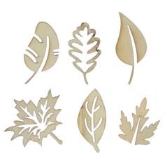 wooden cutouts of leaf shapes on a white background