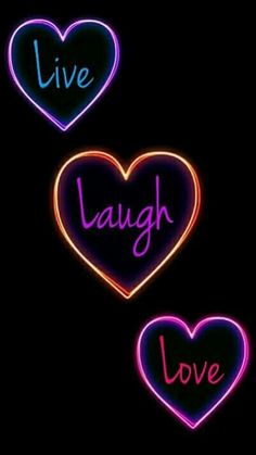 three neon hearts with the words live, laugh and love written on them in different colors