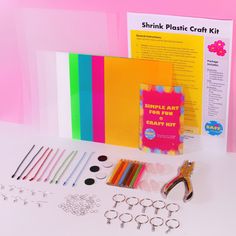 the pink plastic craft kit is full of supplies