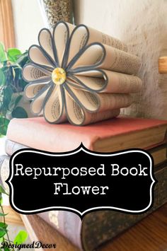 books stacked on top of each other with the words repurposed book flower above them