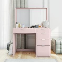 a pink desk with drawers and a mirror