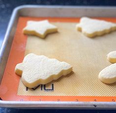 some cookies are sitting on a cookie sheet