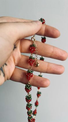 ✨🍓 Dream Necklace! 🍓✨  Have you ever seen anything so adorable? This unique necklace is entirely made of tiny strawberries crafted from Miyuki beads. Each one is a true piece of art, showcasing incredible precision and detail. The perfect accessory for summer days, adding a fresh touch to any outfit. 💫  #HandmadeJewelry #StrawberryNecklace #BeadedJewelry #MiyukiBeads #Craftsmanship #SummerVibes #UniqueAccessories #jewelrylover #strawberry #beading #beads #beadwork #jewelry #fruit #foodart Fruit Jewelry Diy, How To Make A Beaded Strawberry, Beaded Accessories Ideas, Bead Art Ideas, Beaded Strawberry Tutorial, Beadwork Patterns Free Seed Bead Tutorials, Beaded Jewelry Patterns Free, Beads Strawberry Tutorial, Strawberry Seed Bead Necklace