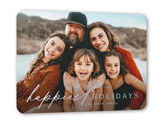 a family photo with the words happiness holidays on it