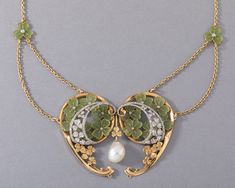 One very beautiful antique necklace, from Art Nouveau era, made in France circa 1900. Made in yellow gold 18k, diamonds enamel a big natural pearl. French hallmarks for gold 18k: the eagle head. The necklace length / turn is 39.5 cm or 15.8 inches. Dimension of enamel / central part: 6.8 cm and 5cm. The pearl measures 13 * 10 mm. Total weight 29.4 grams Art Nouveau Jewelry Vintage, Art Nouveau Necklaces, Bijoux Art Nouveau, Emerald Necklace Pendant, Art Nouveau Antiques, Gold Locket Necklace, French Art Nouveau, Art Nouveau Pendant, Nouveau Jewelry