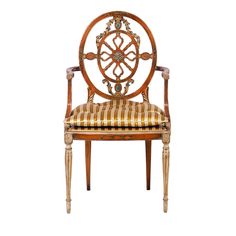 an antique chair with striped upholstered seat and arm rests against a white background