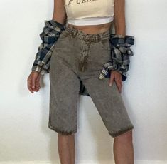 "+ Original 80s Sasson USA made vintage bareback long jeans shorts w sky high waist + Personally I love the long leg because its unique but certainly you can make these into cut-offs at any length + Please see all details below before purchase.... D E T A I L S ERA: 1980s  BRAND: Sasson, USA made VINTAGE CONDITION: very good COLORS: brown acid wash MATERIAL: cotton denim S I Z I N G MEASURES: 27 waist doubled across 13.75\" rise in back / 13.50\" in front 20\" hips seam to seam (40 doubled) 16\" Jean Shorts Long, High Waist Jean Shorts, Long Jean Shorts, Cut Offs, High Waisted Jean Shorts, Colors Brown, Long Jeans, Conscious Consumer, Short En Jean