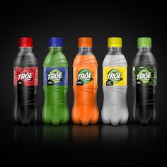 six bottles of fruit flavored soda are lined up in a row on a black background