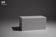 a white cube sitting on top of a table