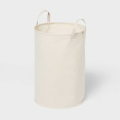 a white canvas storage bag with handles