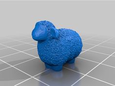 a blue toy sheep sitting on top of a tiled floor