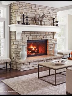 a living room with a fire place in it