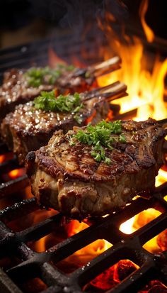 steaks cooking on the grill with flames in the background