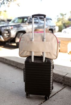 BACK BY POPULAR DEMAND! Duffle Bag - Let's Go Color: – Cream/Lt.Pink/Mint _________________________________________________ Sizing / Material This FUN shaped bag fits in most airplane overhead compartments and meets most airline carry-on restriction requirements! This roomy duffle bag can hold up to 20lbs! Our duffles are 100% Vegan leather and are fully lined with 100% polyester. Overall dimension 20 ½” L X 9” W & sits 12” Fun Features: Our Let's Go Duffle has beautiful chenille embroidered lettering sewn directly onto front of bag, making our duffle so unique and FUN!! There are 2 top handles measuring 9 1/4" tall for easy grip. It has a 12" Trolley Sleeve for easy travel!! This bag also contains a removable/adjustable cross body strap which extends to 42" giving you two convenient ways Embroidered Lettering, Dimension 20, Holiday Tops, Easy Travel, Shoe Sale, Sales Gifts, Bag Making, Cross Body, Letting Go