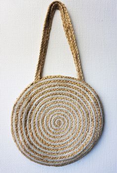 Welcome to my shop. These bags are environmentally friendly and made from 100% natural jute and cotton. These bags are made for your long walks, to ensure your travel comfort and give you elegant beach style. It adds casual charm to your everyday personality. The straps are made fine and strong so you can easily carry it on your shoulder and your hands are free. Hence a very convenient type of bag. Item: handmade braided Size: 30x30x80cm Type: shoulder bag / cross for bag Material: jute cotton M Eco-friendly White Bag With Natural Fiber, Eco-friendly White Bag In Natural Fiber, Eco-friendly Cream Beach Bag, Eco-friendly Cream Jute Shoulder Bag, White Jute Crochet Bag For Daily Use, White Jute Beach Bag For Daily Use, Eco-friendly Beige Burlap Straw Bag, Eco-friendly Handmade Burlap Shoulder Bag, Eco-friendly Cream Shoulder Bag