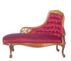 a red and gold chaise lounge chair