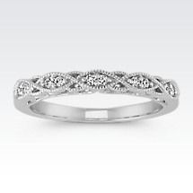 a white gold wedding band with diamonds