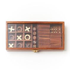 wooden tic - tac - toe game in its box on a white background