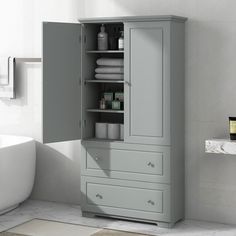 a bathroom with a cabinet and sink in it