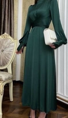 Made with premium satinDry clean onlyFull closure zip in the backfree hijab included Simple Dress For Graduation Party, Modest Graduation Dress, Dresses Soirée, Elegant Silk Dresses, Estilo Hijab, Stile Hijab, Soiree Dress, Affordable Bridesmaid Dresses, Modest Dresses Casual