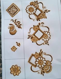 hendi tattoos on paper with gold and white designs