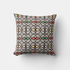 a pillow with an abstract design on it