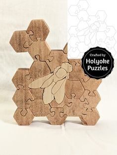 the wooden puzzle is shaped like a dog